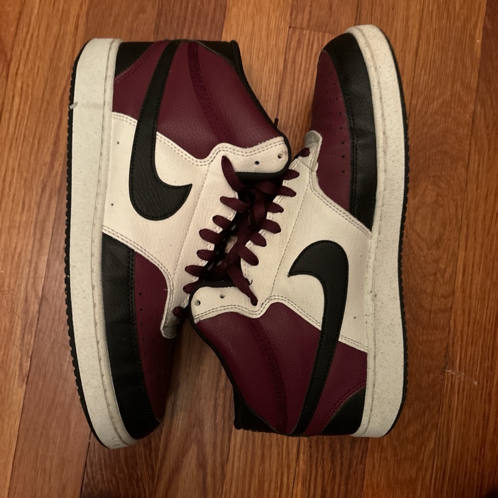 Maroon and white Nike high tops